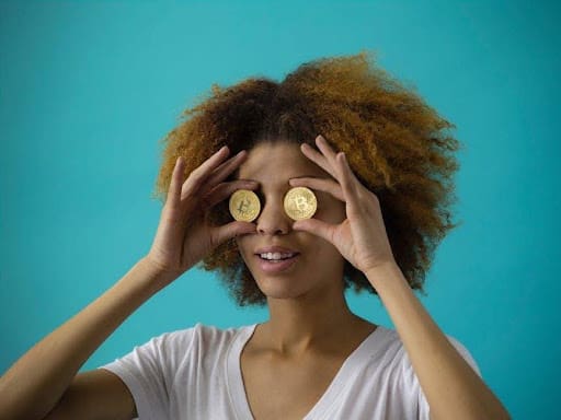 woman-holding-two-coins